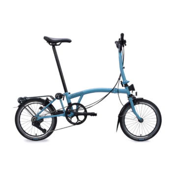 Brompton C Line M12R Cloud Metallic with Mid handlebar and roller rack, full bicycle on a white square background