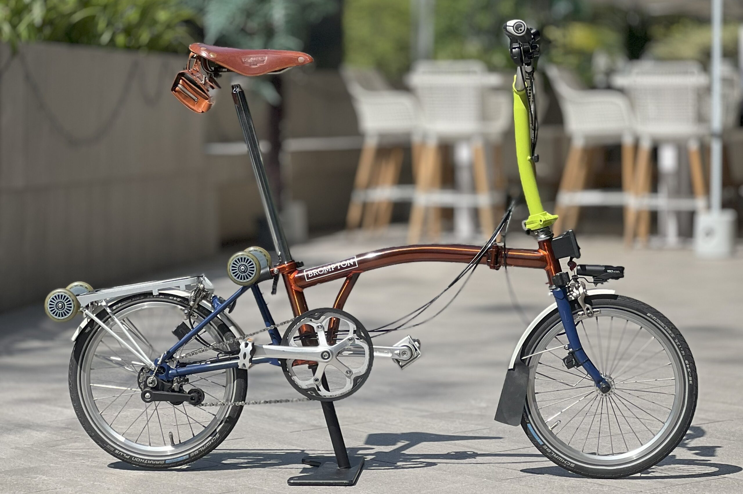 Multi-coloured Brompton C Line M6R Flame Lacquer rental bike