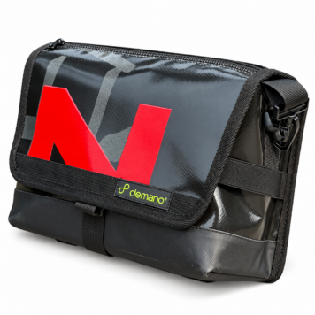 Demano Ribera 1704 charcoal and black Brompton mini front bag with a red front letter, grey banner details and black trim on white.