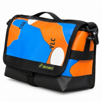 Demano Ribera 1706 Brompton mini front bag with blue and orange abstract graphics, white accents, cropped black lettering and black trim on white.
