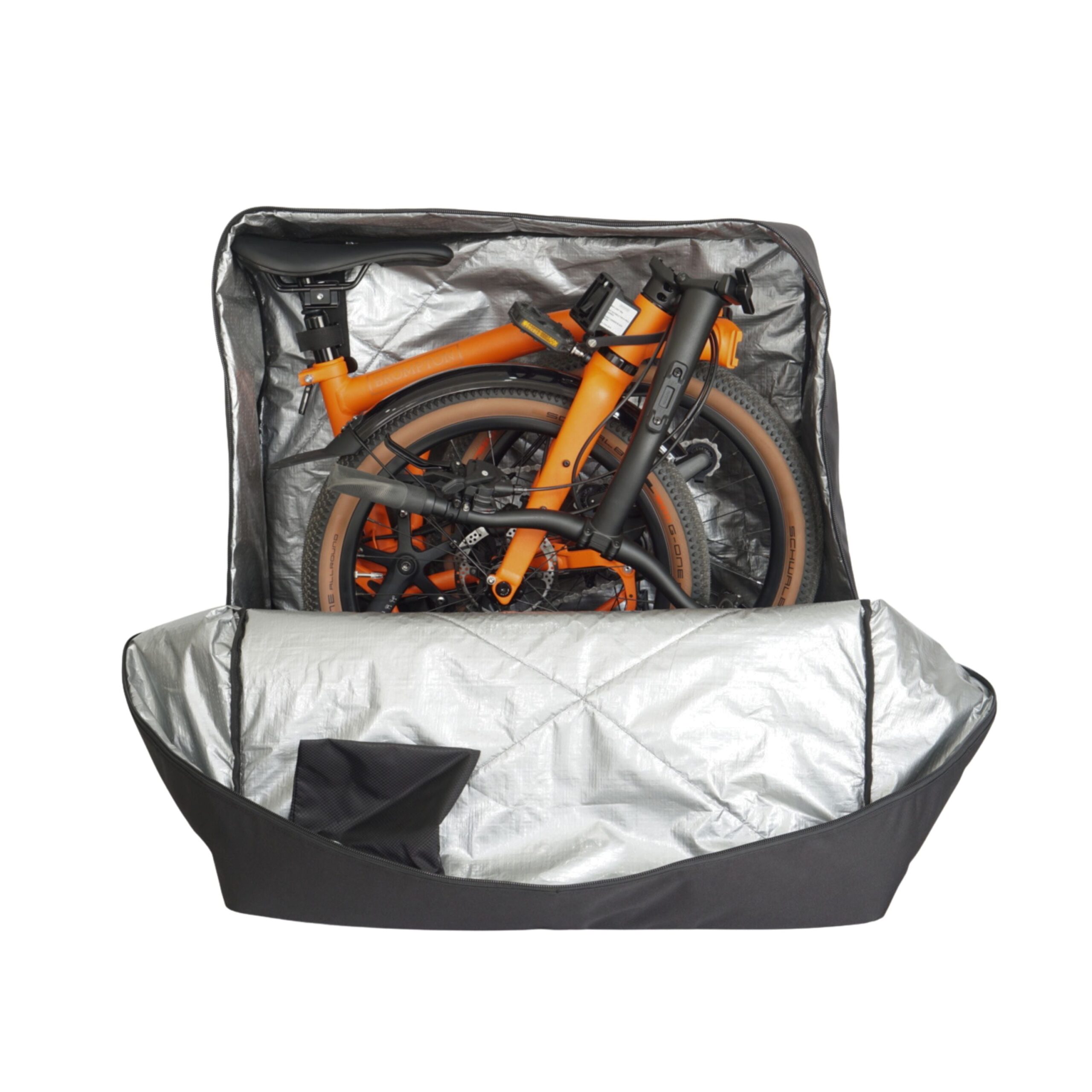 Folded orange Brompton G Line inside an open black Vincita Sightseer travel bag with silver lining.