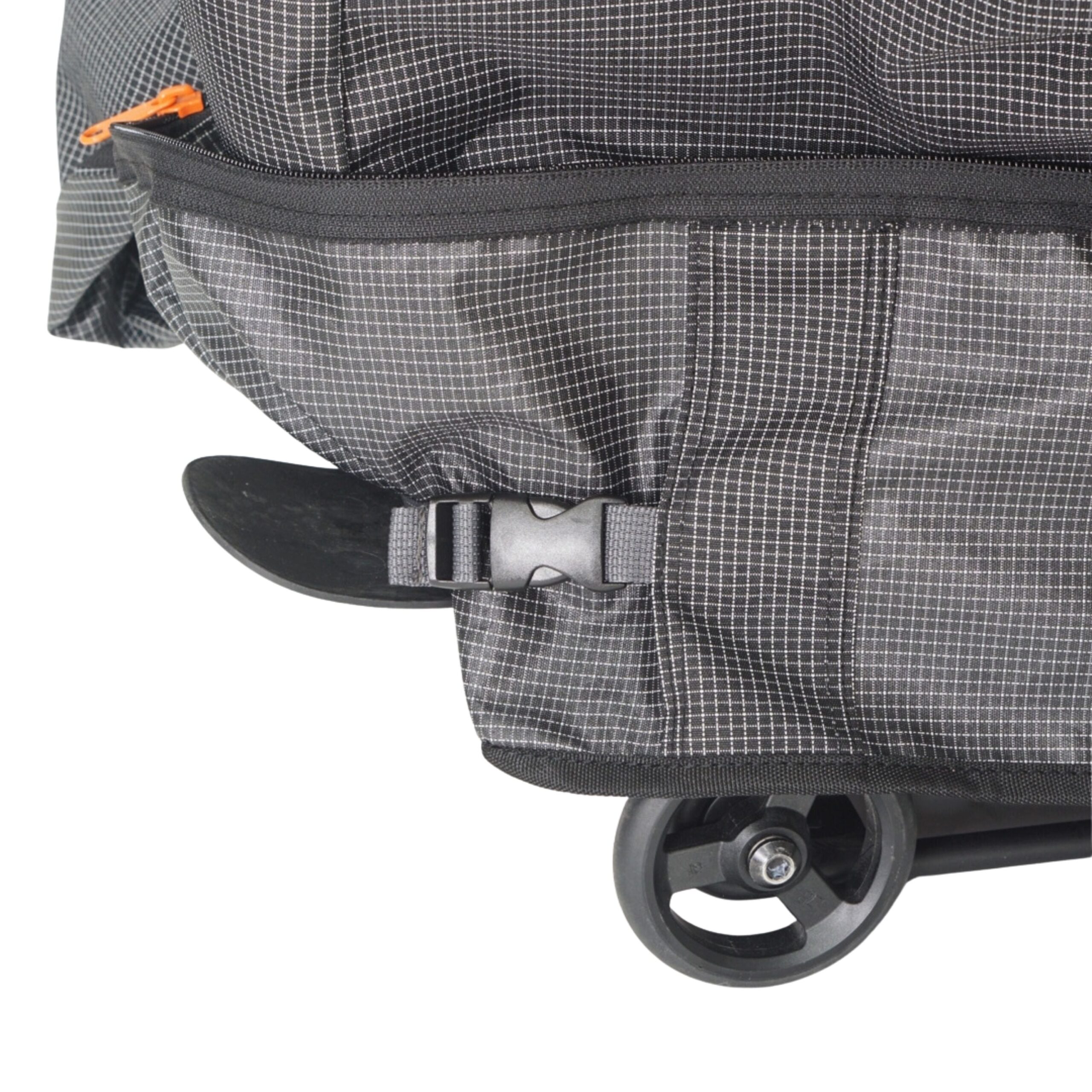 Bottom zip opening on Vincita Invisibility cover showing access to Brompton G Line roller wheel.